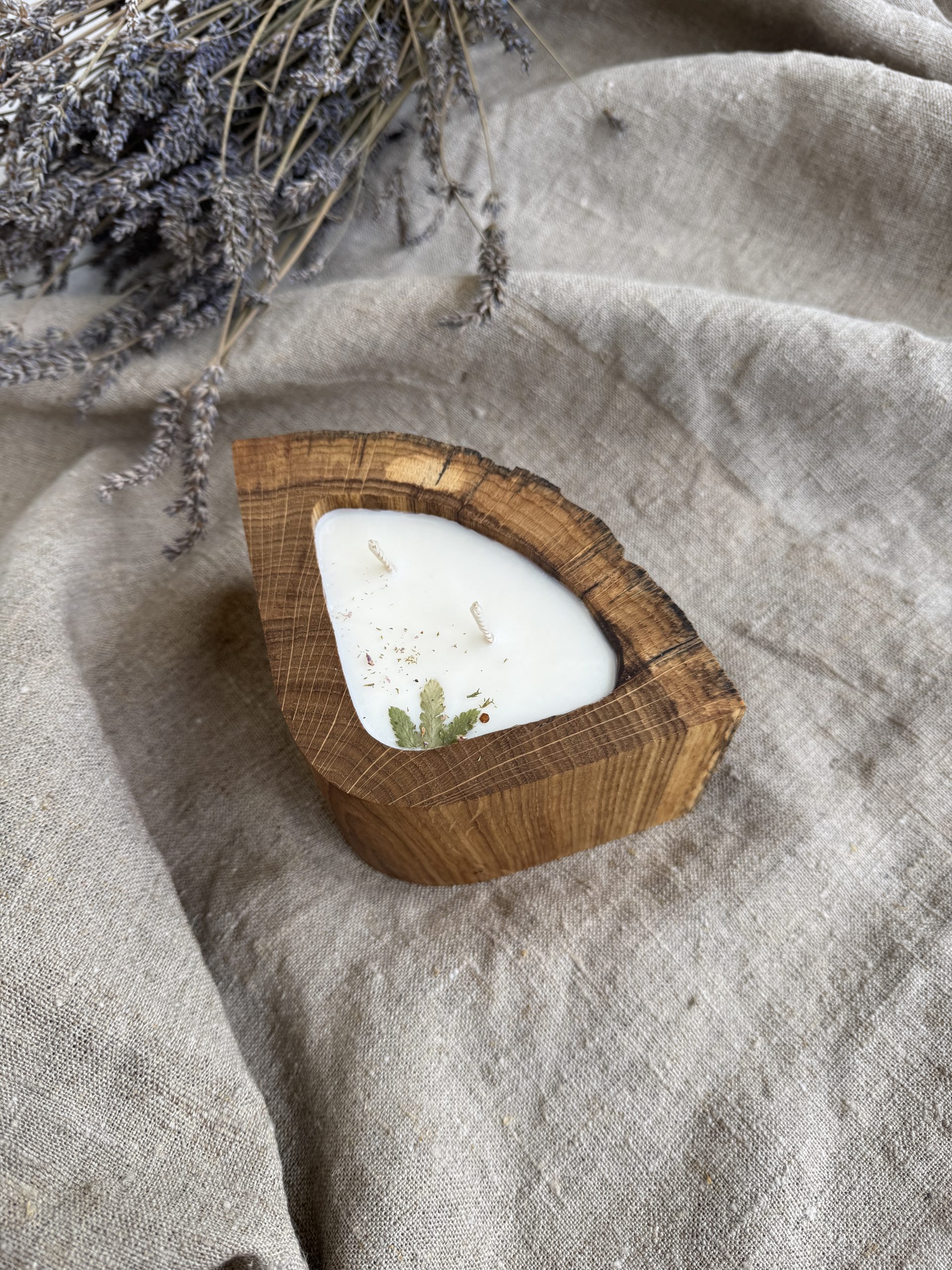 Handmade unscented soy candle in rustic oak wood vessel