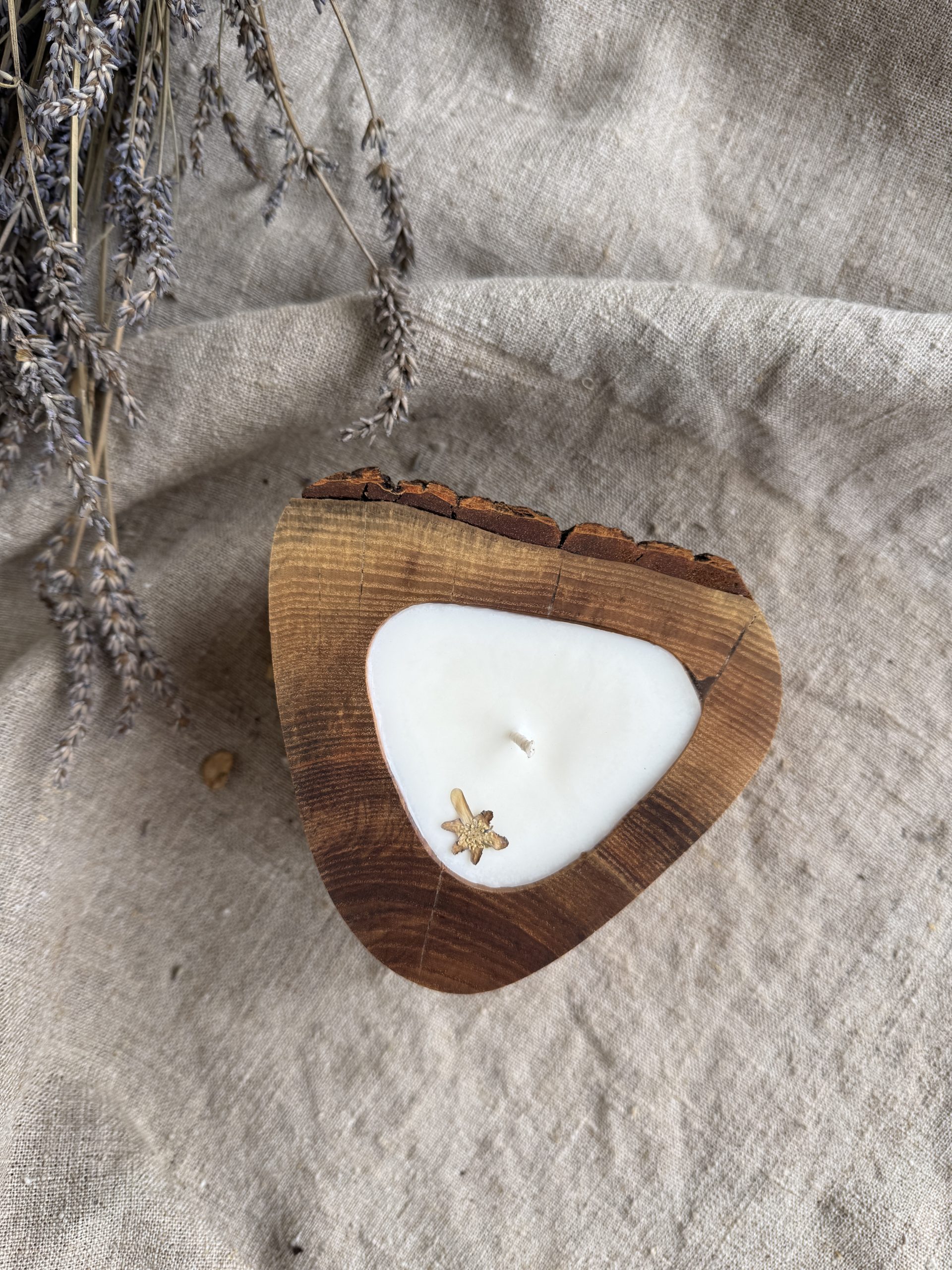 Handmade vanilla soy candle in natural ash wood vessel