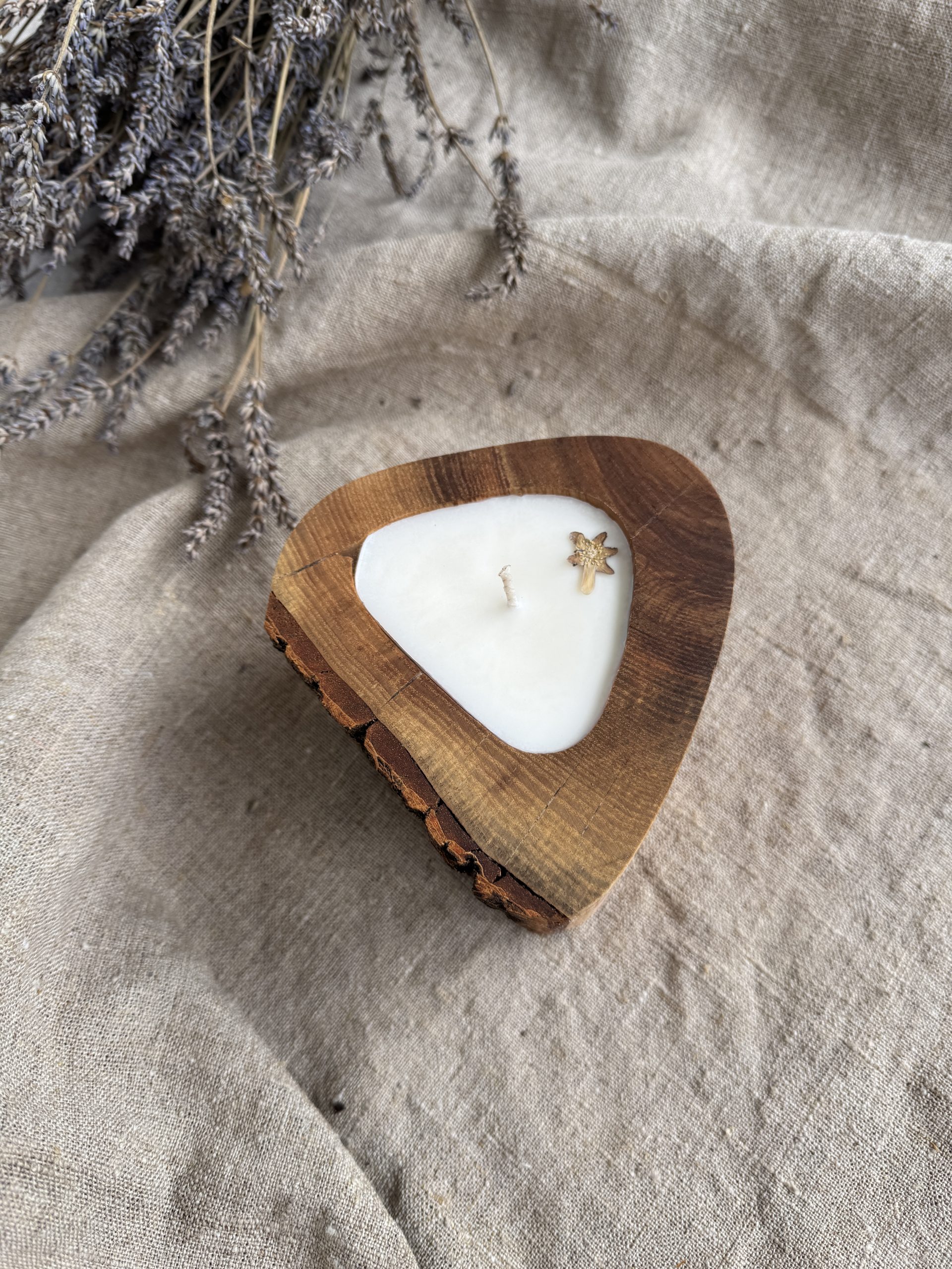 Handmade vanilla soy candle in natural ash wood vessel