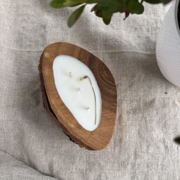 Handmade Siena Elegance soy wax candle in natural aspen wood with three cotton wicks and bark edge