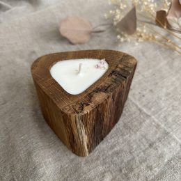 Handmade unscented soy wax candle in natural oak wood vessel with single cotton wick and natural wood grain