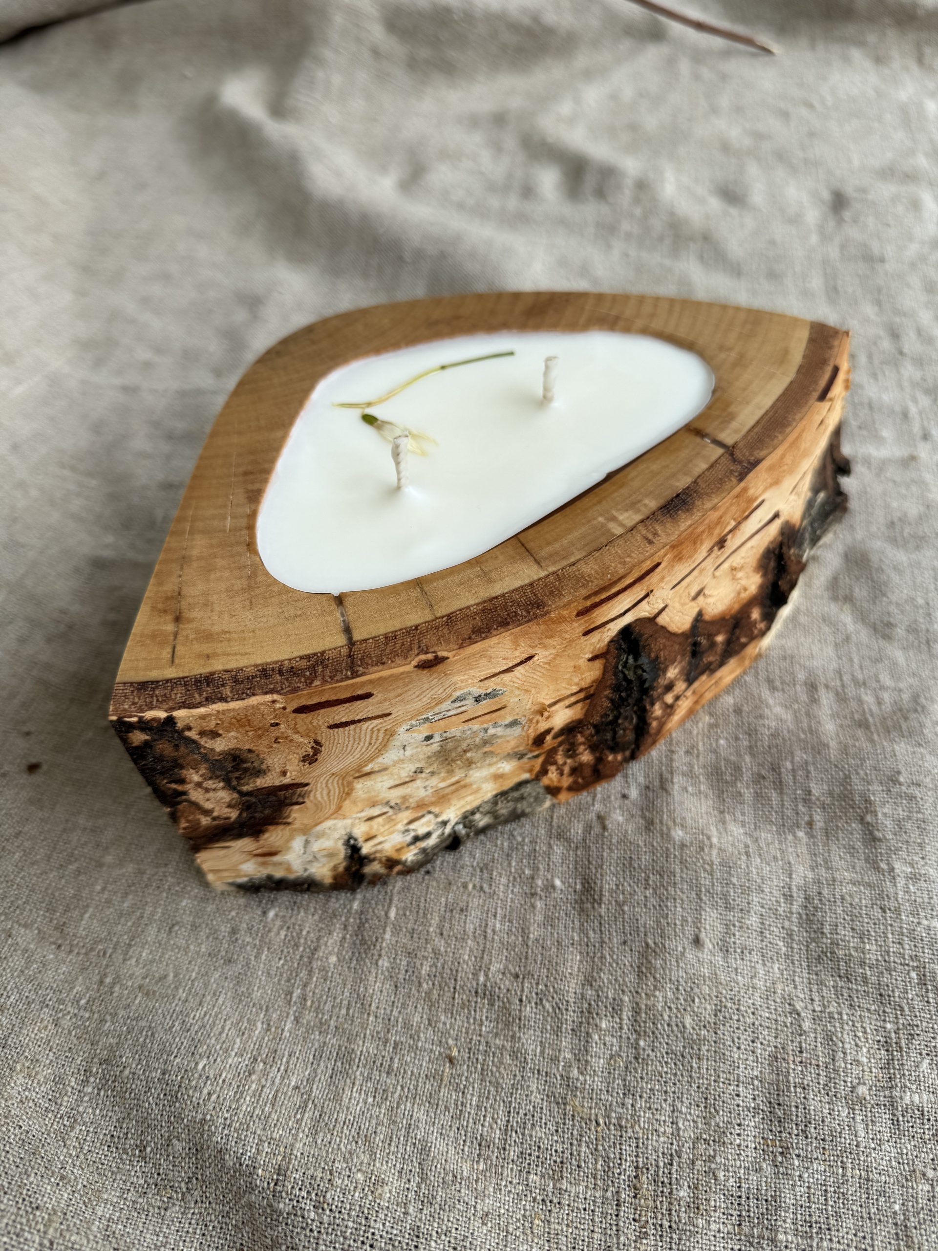Handmade Vanilla soy wax candle in natural birch wood vessel with two cotton wicks