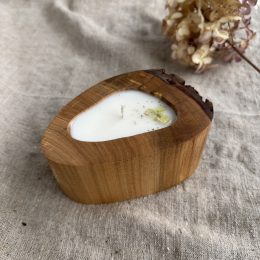 Handmade unscented soy wax candle in natural oak wood vessel with single cotton wick and natural oak grain