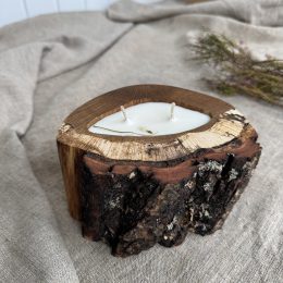 Handmade Peony soy wax candle in natural oak wood vessel with two cotton wicks and natural bark edge