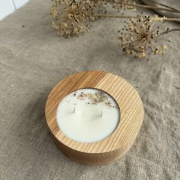 Handmade Vanilla soy wax candle in round natural ash wood vessel with two cotton wicks and dried flower decoration