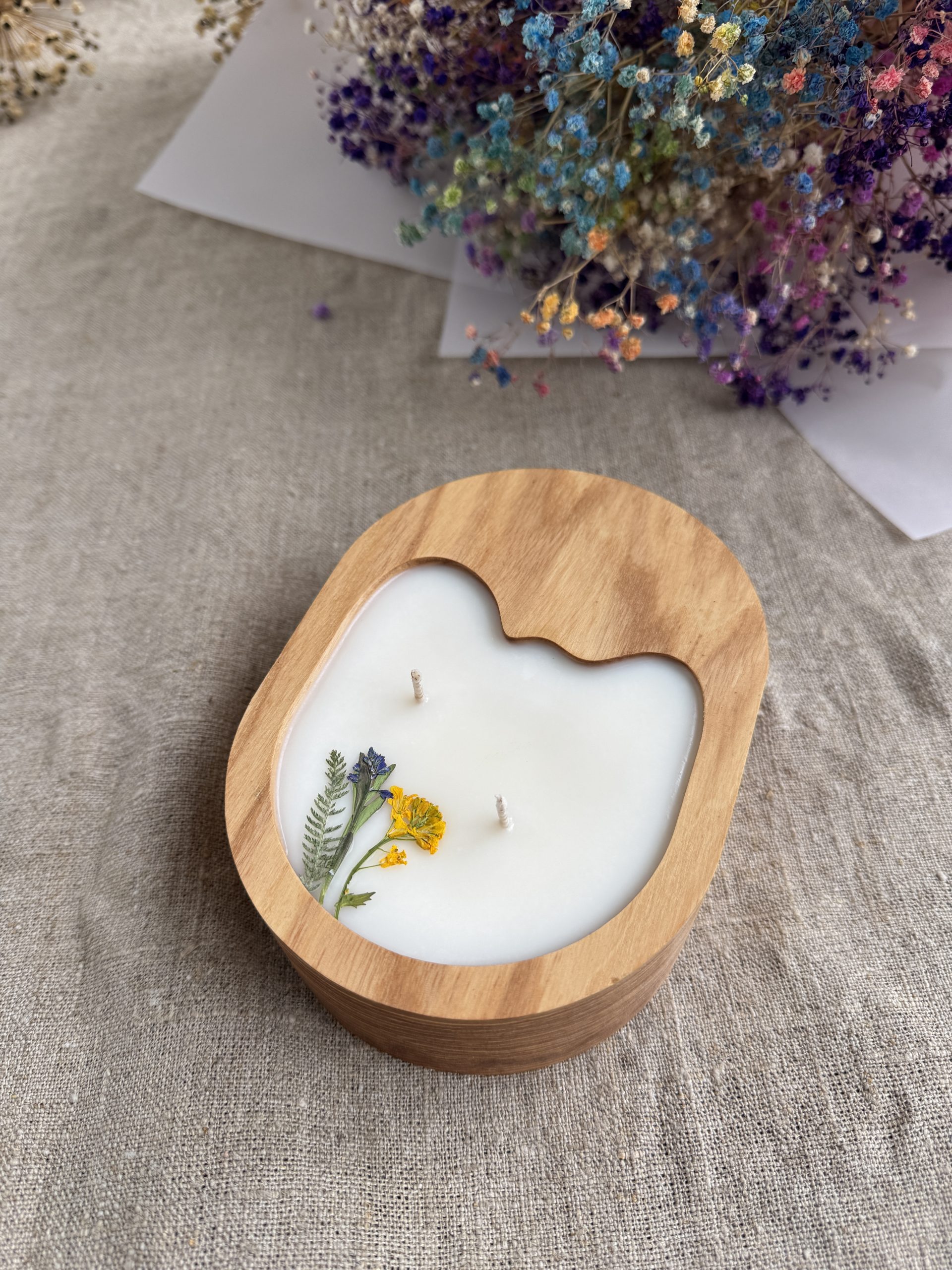 Handmade Lavender soy wax candle in natural ash wood vessel with two cotton wicks and dried flower decoration