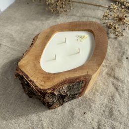 Handmade unscented soy candle in natural birch wood with live bark edge and three cotton wicks
