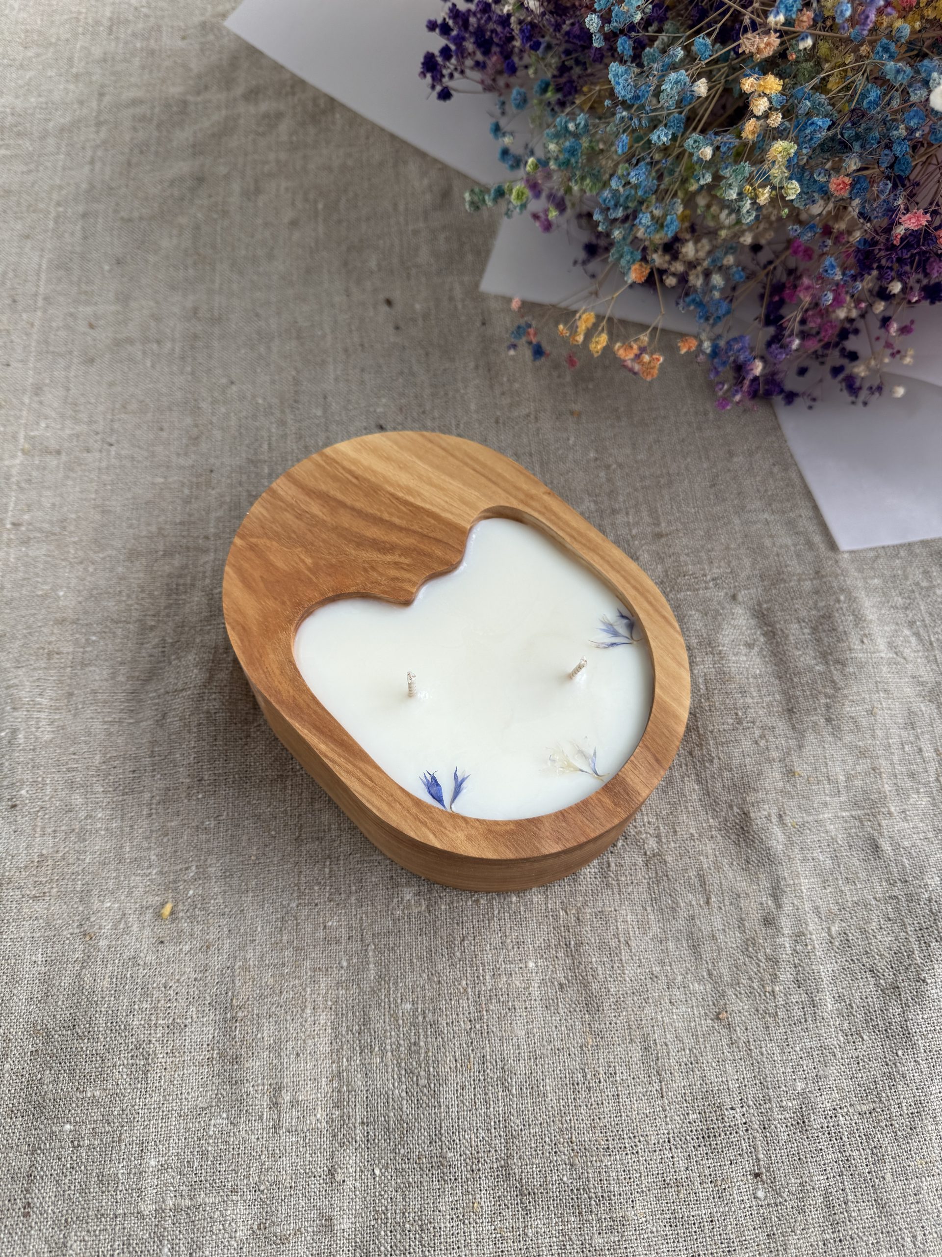 Handmade unscented soy candle in natural ash wood with heart-shaped design and two cotton wicks