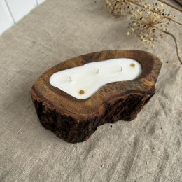 Handmade oak wood soy candle with Magnolia fragrance, natural bark edge and three cotton wicks
