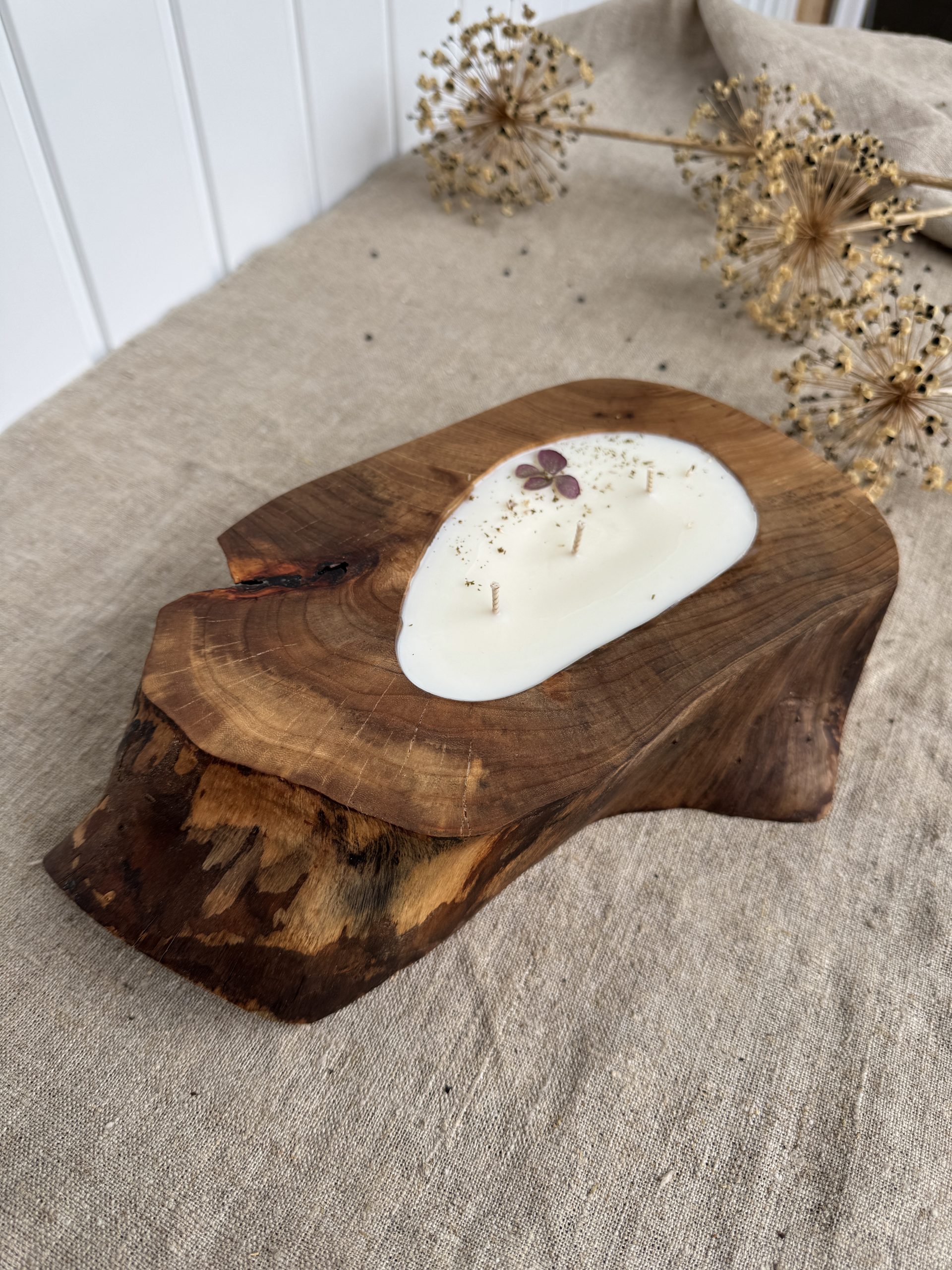 Handmade ash wood candle with three wicks and Sienna Elegance fragrance in a unique natural wooden vessel